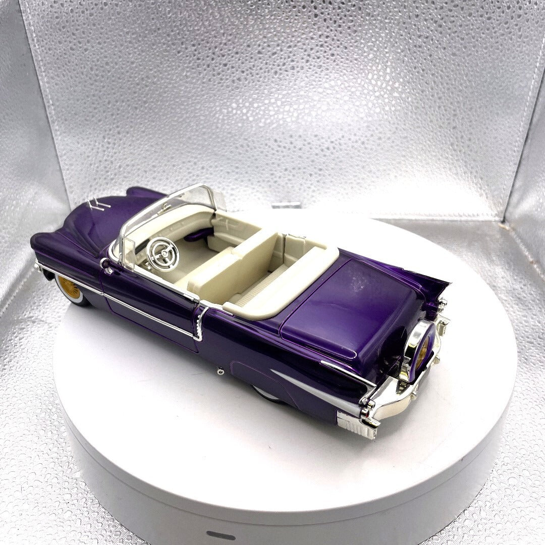 Jada Elvis Presley 1956 Cadillac Eldorado Purple Die Cast, Scale: 1/24, No. 31002 driver's side/rear view