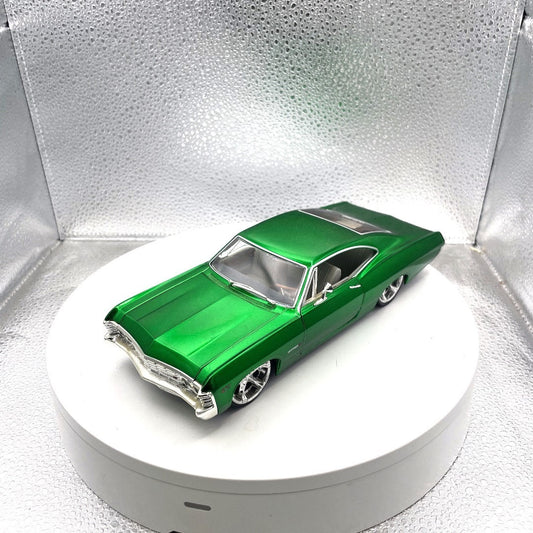 Jada Toys 1967 Chevrolet Impala SS Green Die Cast Dub City OldSkool, Scale: 1/24, No. 50310-9 front end/drivers side view