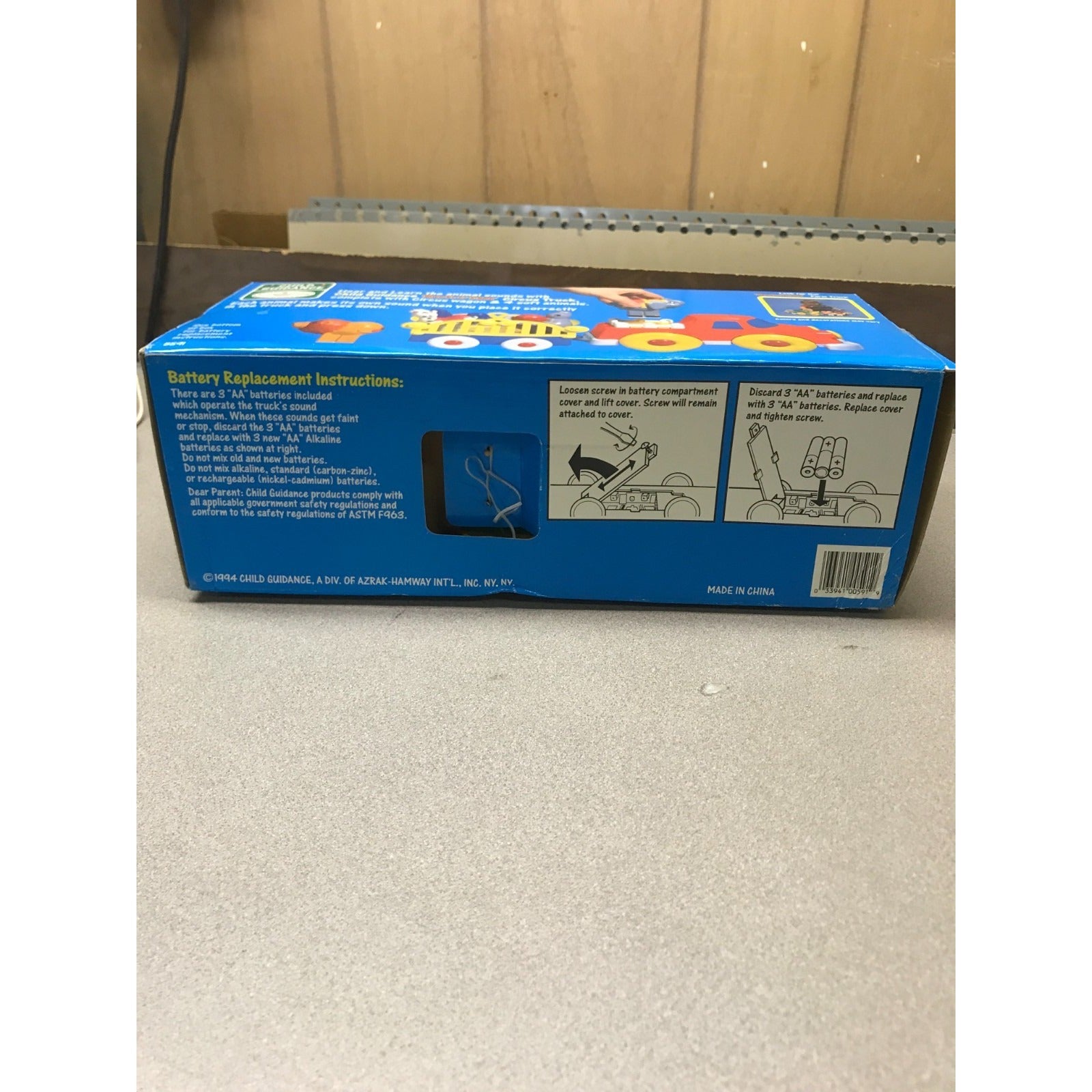 Vintage Touch and Play Animal Sounds Circus Truck bottom of box battery replacement instructions