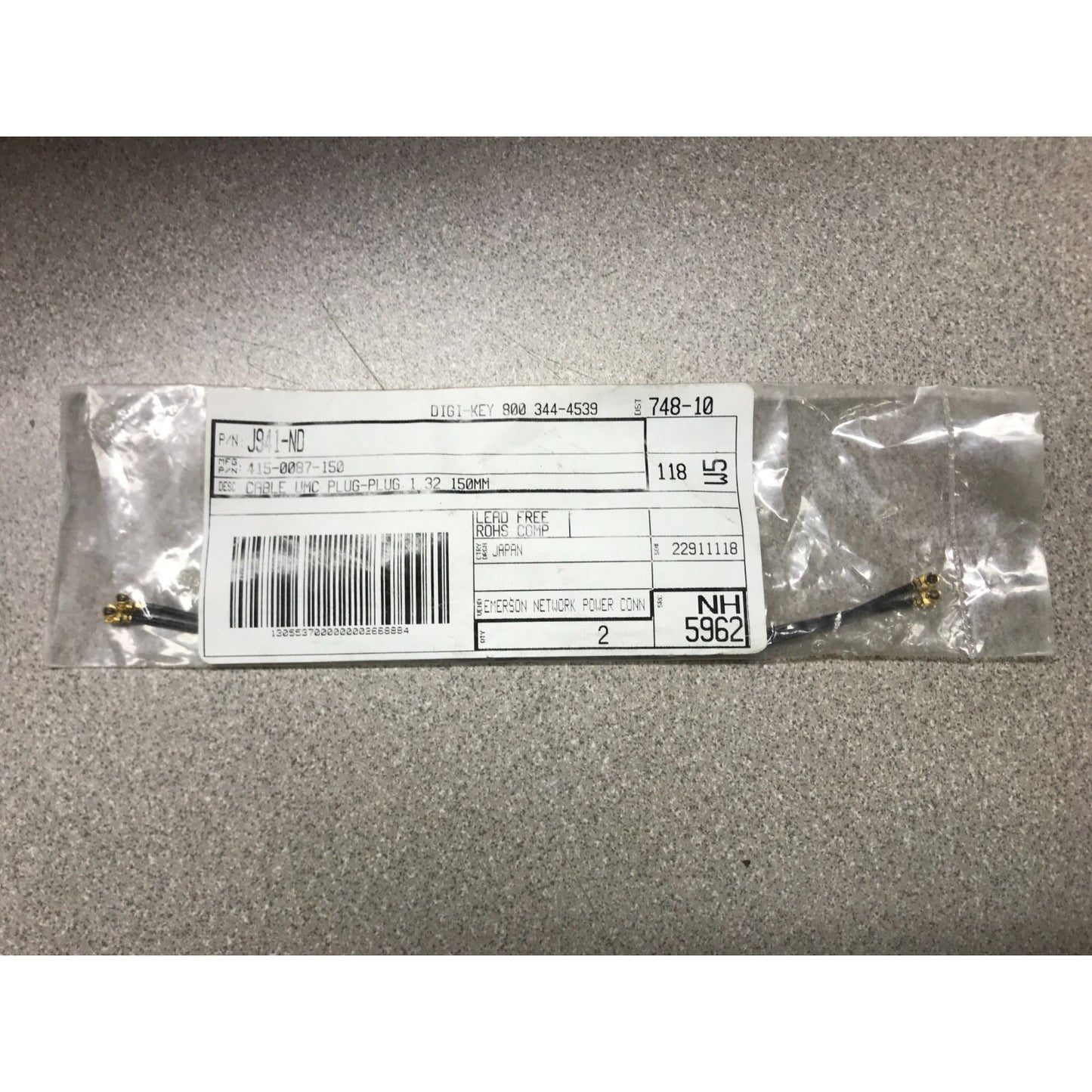 415-0088-150 Johnson Coaxial Assembly Cable Female UMC 1.32 mmOD 150mm, Digi-key P/N: J941-ND connector in packaging with product label