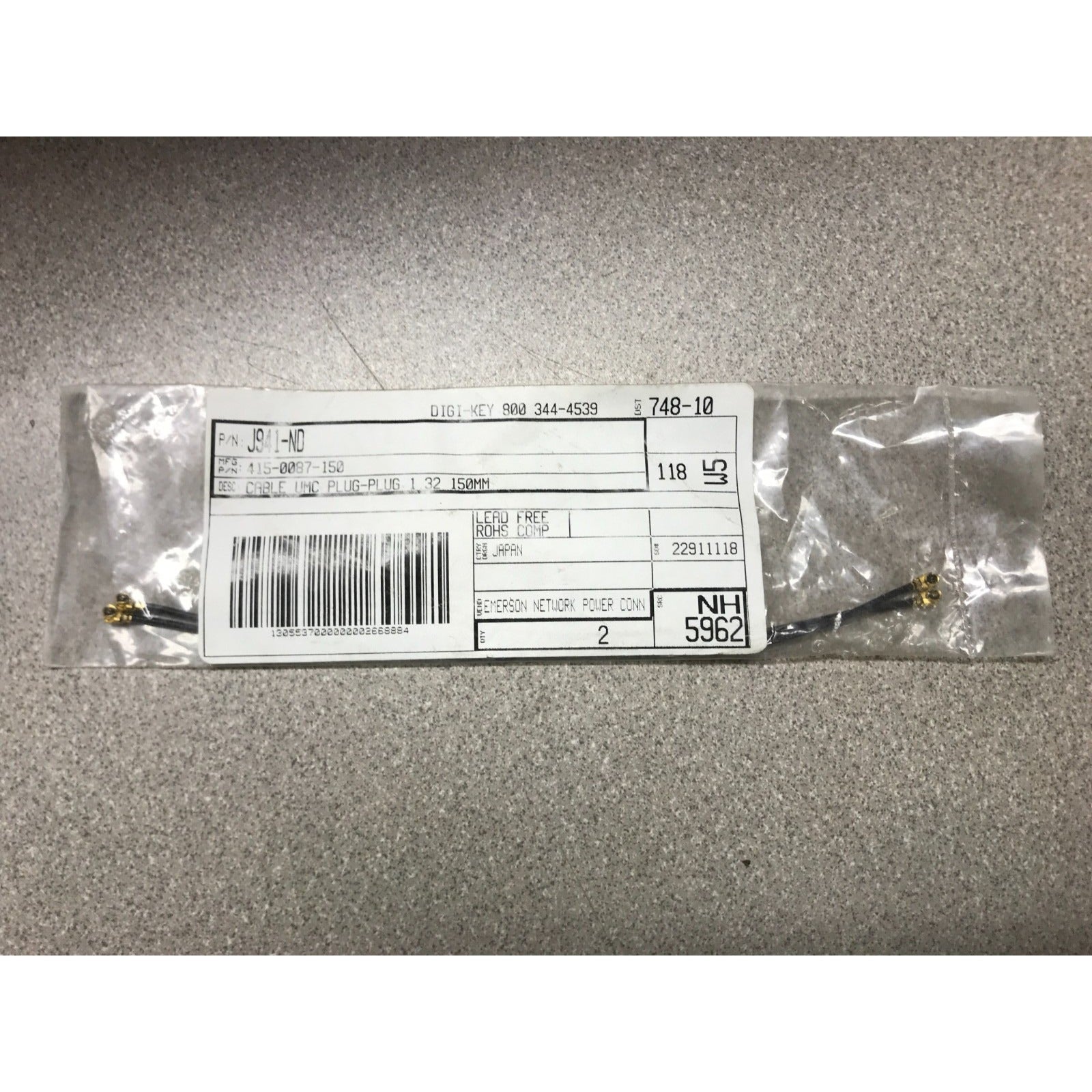 415-0088-150 Johnson Coaxial Assembly Cable Female UMC 1.32 mmOD 150mm, Digi-key P/N: J941-ND connector in packaging with product label