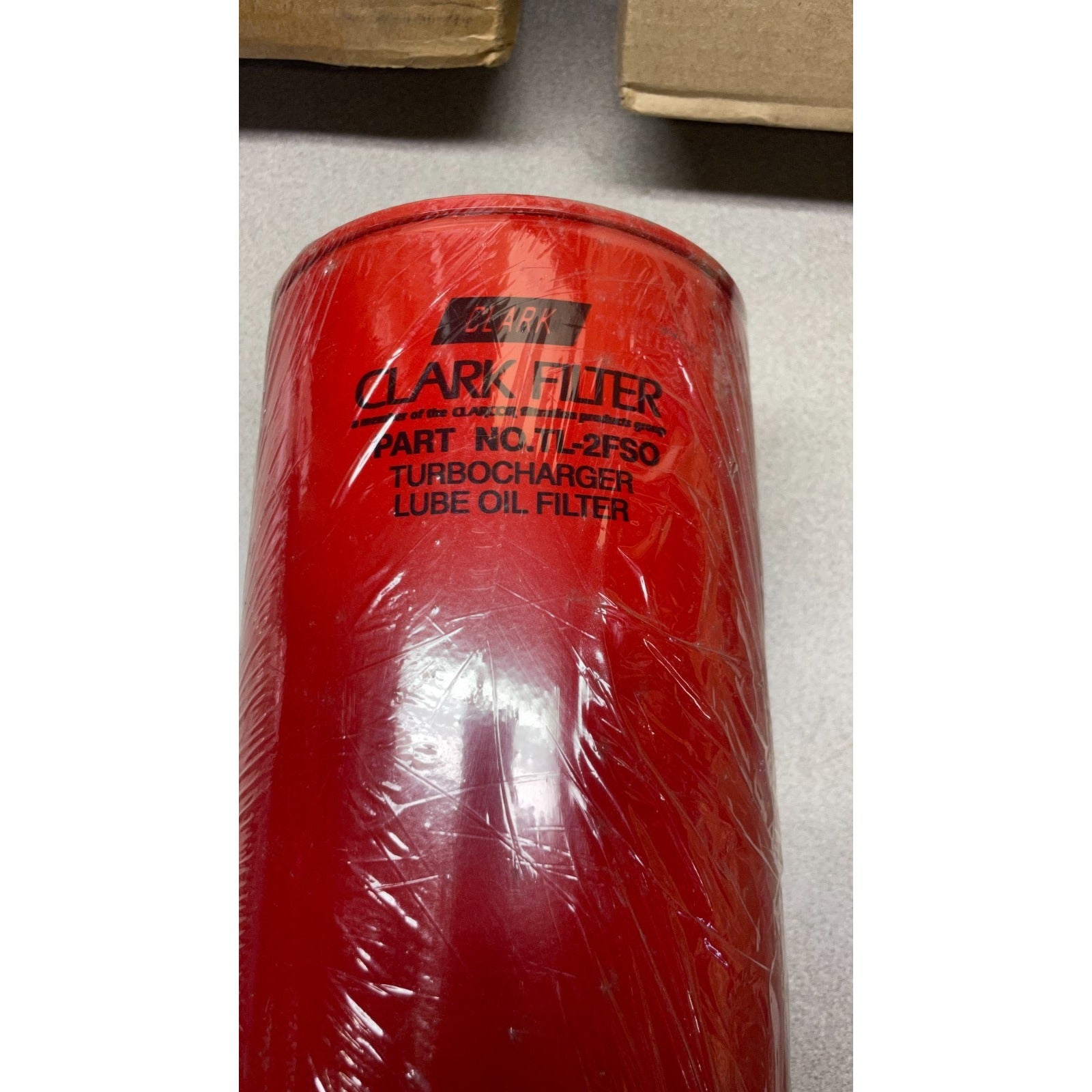 Clark Oil Filter, Part No.TL-2FSO Turbocharger Lube Oil Filter closeup of Clark Filter product information