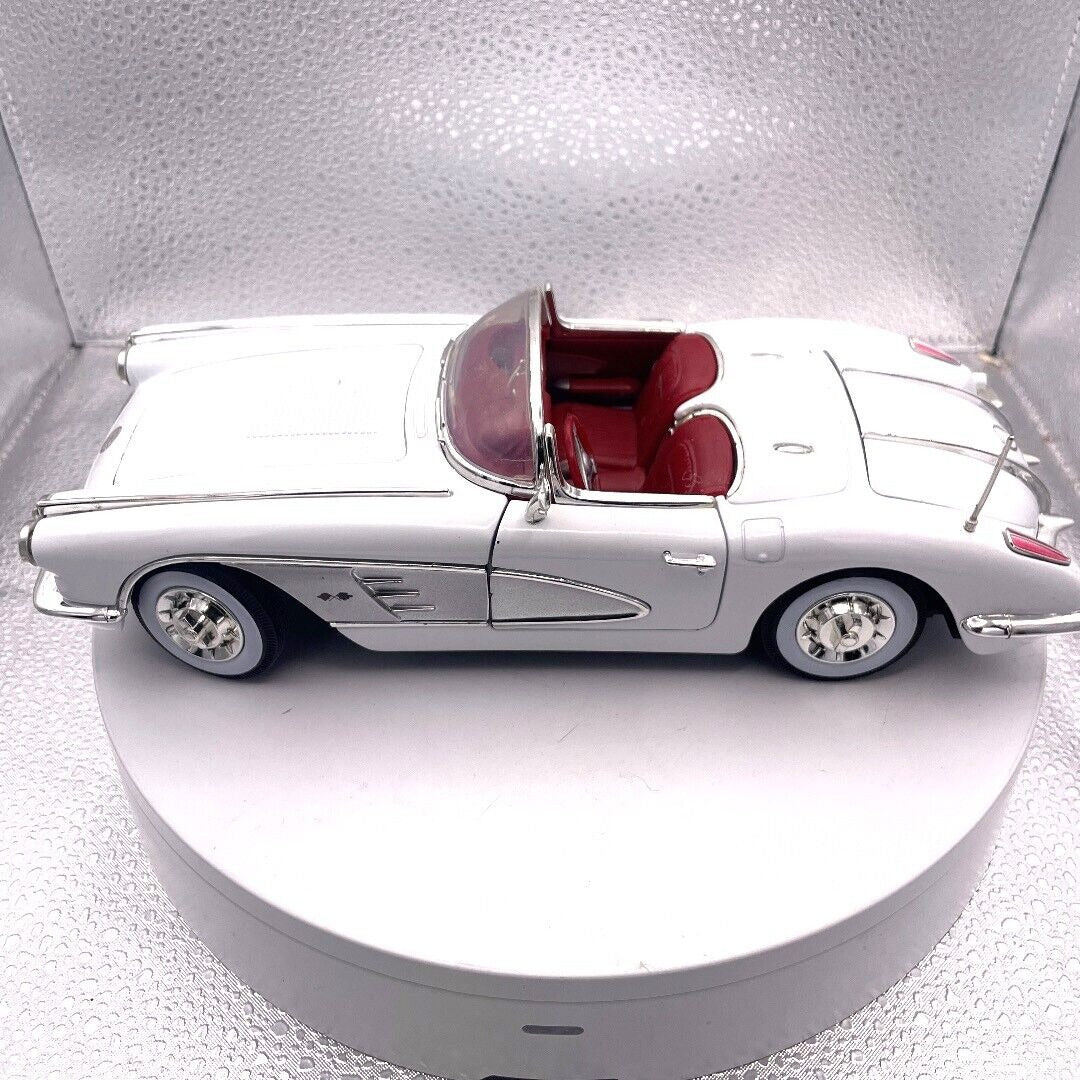 Motormax 1958 Corvette White Die Cast, Red Interior, 1/18 Scale, No. 73109 driver's side view