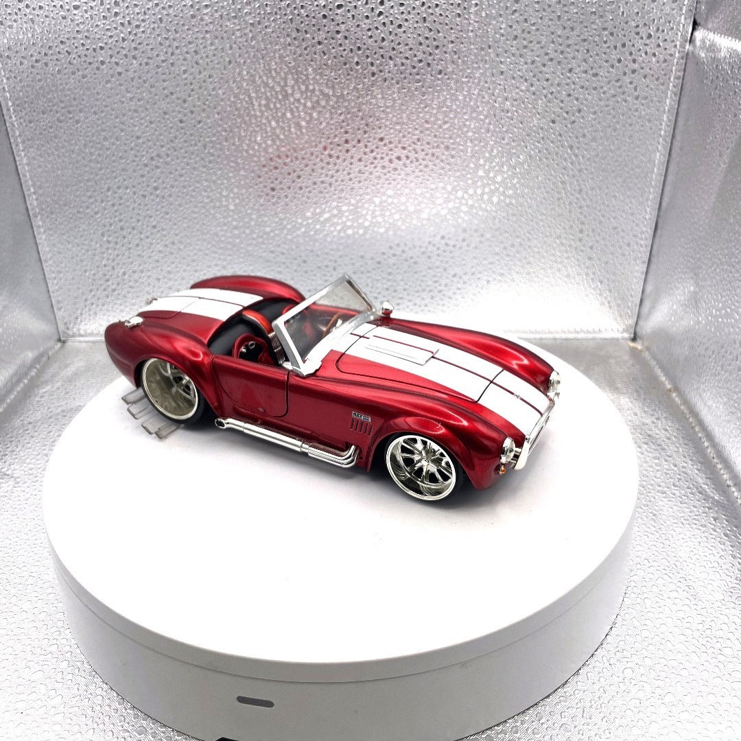 Jada Toys 1965 Shelby Cobra 427 S/C Red Die Cast, Scale: 1/24, No. 90540 passenger side/front end view