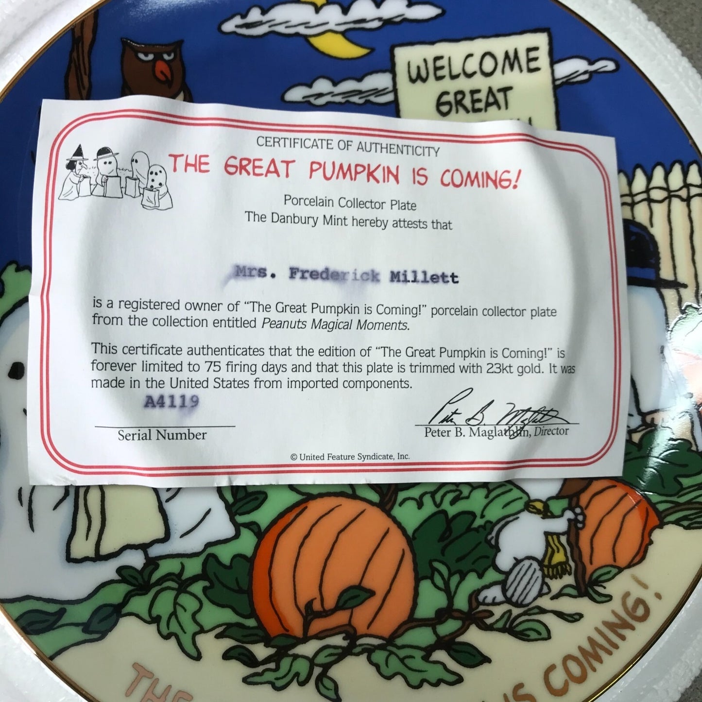 The Danbury Mint Peanuts Magical Moments Plates "The Great Pumpkin is Coming!," "Merry Christmas Charlie Brown!," "Good Grief!," "It's a Hit!" Serial No. A4119 registration certificate slightly smudged