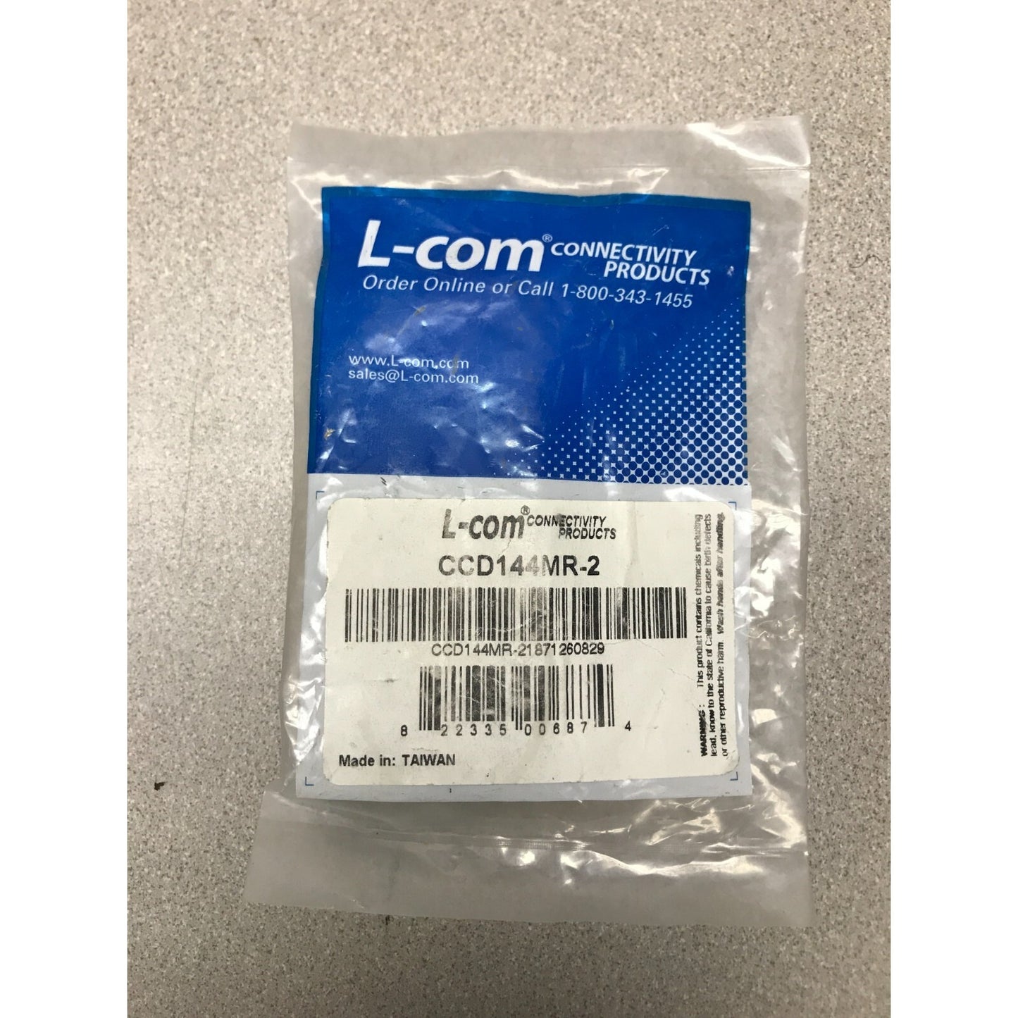 L-Com 4-Pin Mini DIN Male (S-Video) to Single RCA Male Cable 2ft CCD144MR-2 package closeup
