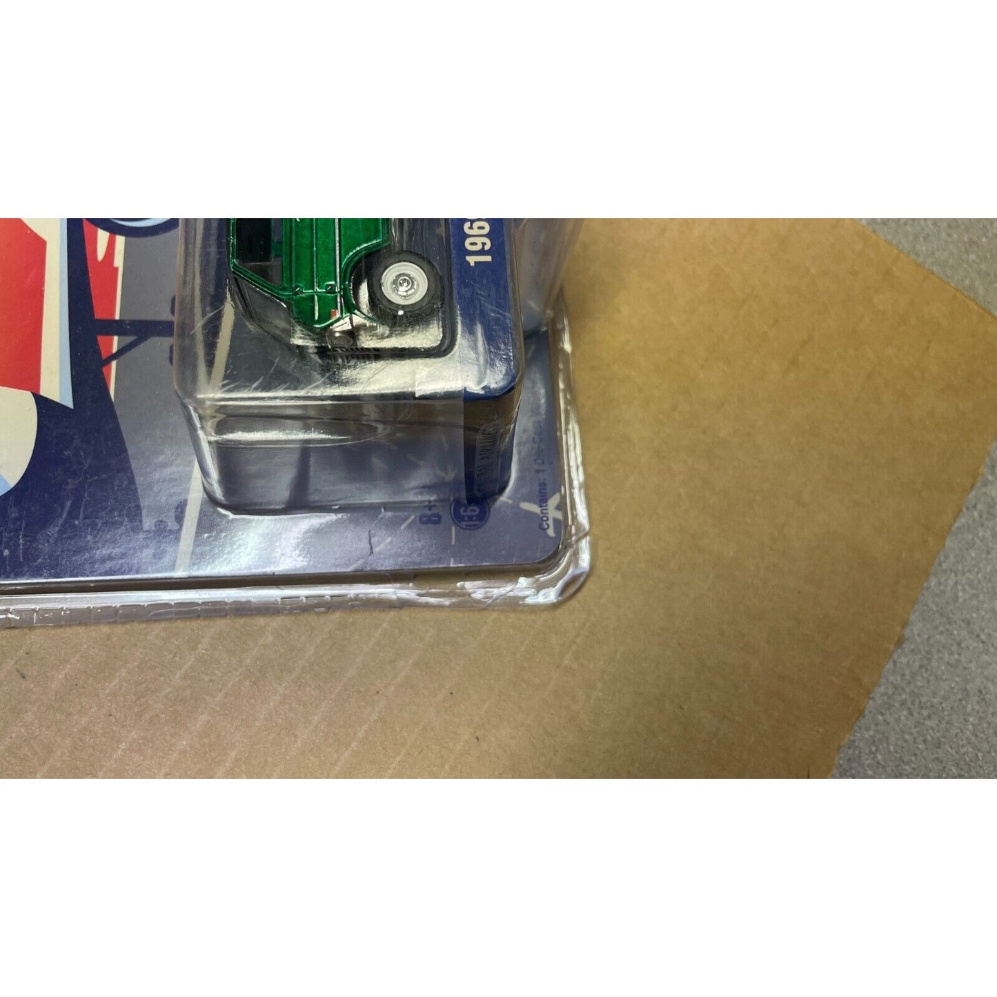 Greenlight 1969 Ford Club Wagon 1:64 corner of package closeup slight damage