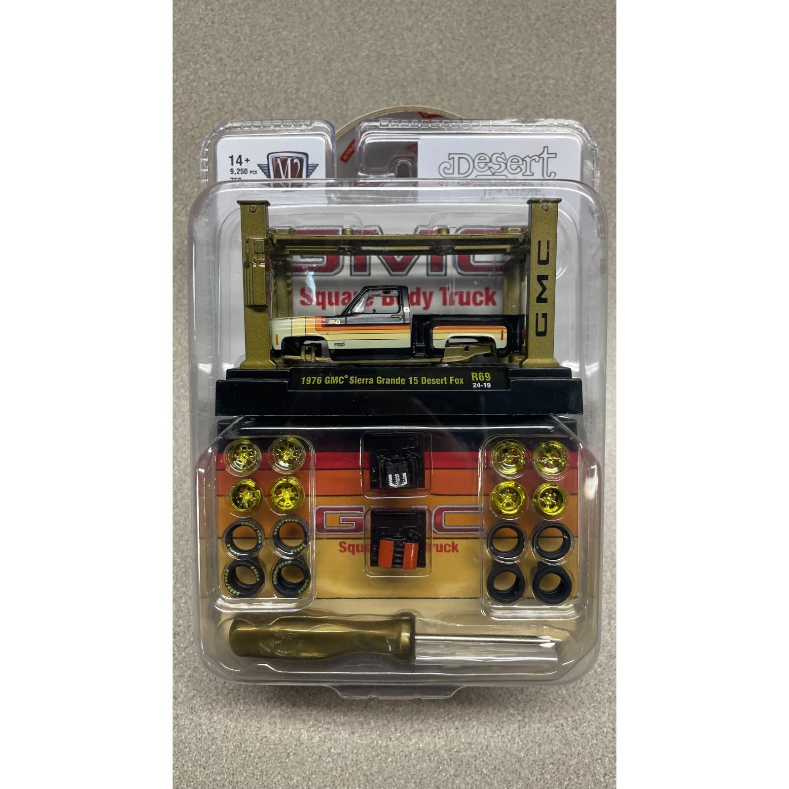 M2 Model Kit 1976 GMC Sierra Grande 15 Desert Fox R69, Chase Piece front of package displaying truck