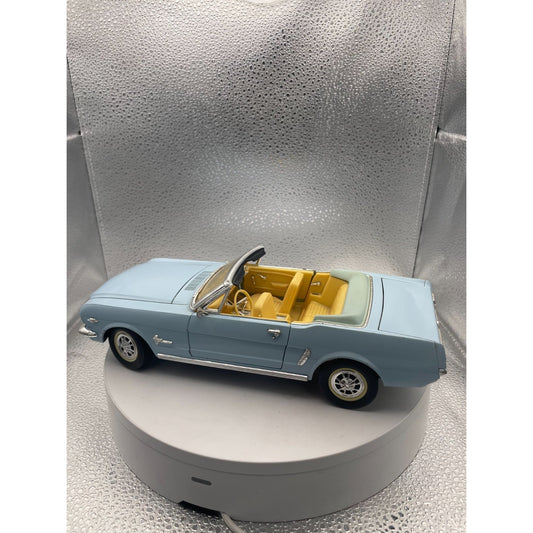 MIRA 1965 Ford Mustang Light Blue Convertible Die Cast, Scale: 1/18 drivers side view