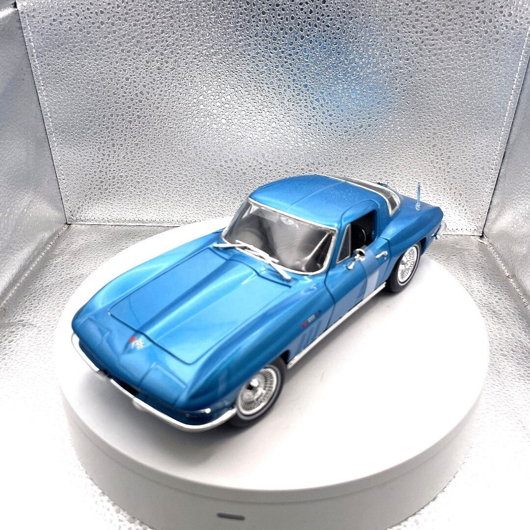 Maisto 1965 Chevrolet Corvette Light Blue Die Cast, Scale: 1/18 front/driver's side view