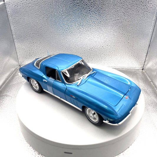 Maisto 1965 Chevrolet Corvette Light Blue Die Cast, Scale: 1/18 passenger/front side view