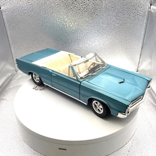 Maisto 1965 Pontiac GTO Convertible Light Blue Die Cast, Scale: 1/18, Special Edition passenger side/front end view