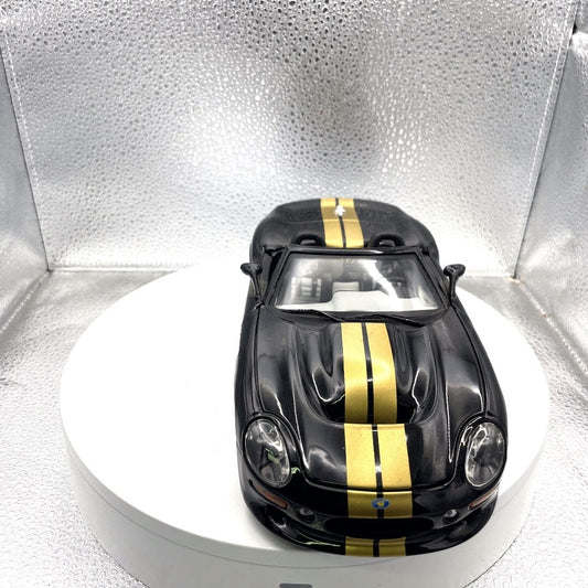 Maisto 1999 Shelby Series 1 Black and Gold Die Cast, 1/18 Scale front view