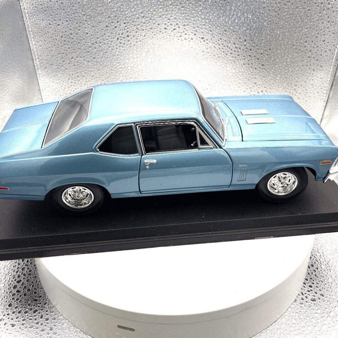Maisto Chevrolet Nova SS Blue Dies Cast with Base, Scale: 1/18 passenger side view