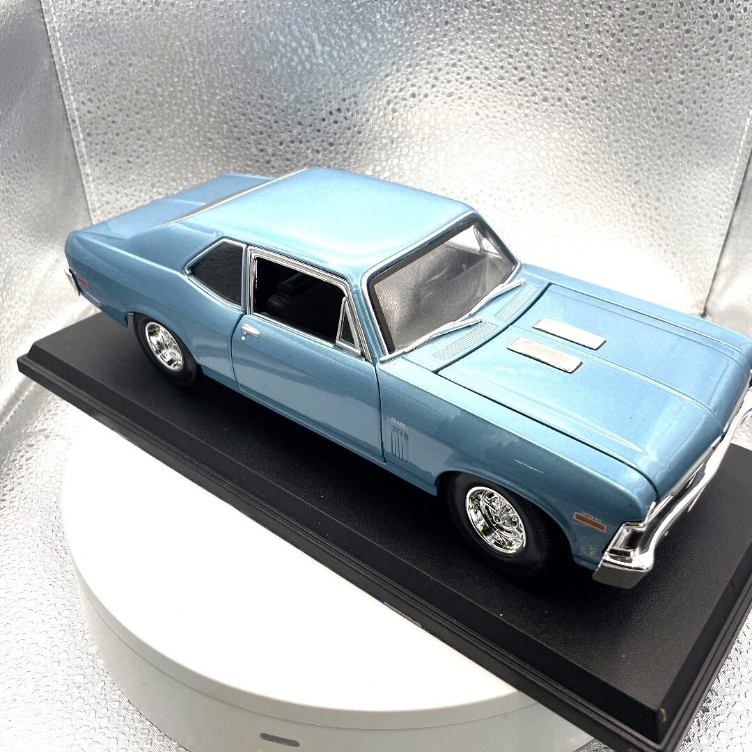 Maisto Chevrolet Nova SS Blue Dies Cast with Base, Scale: 1/18 passenger/front side view