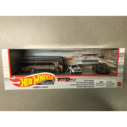Mattel Hot Wheels Premium HW Track Day Set Euro Hauler front of package displays contents