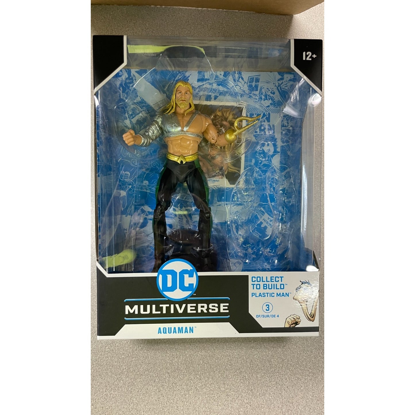 McFarlane Toys DC Multiverse Aquaman Figure, missing a build piece front of package displaying action figure