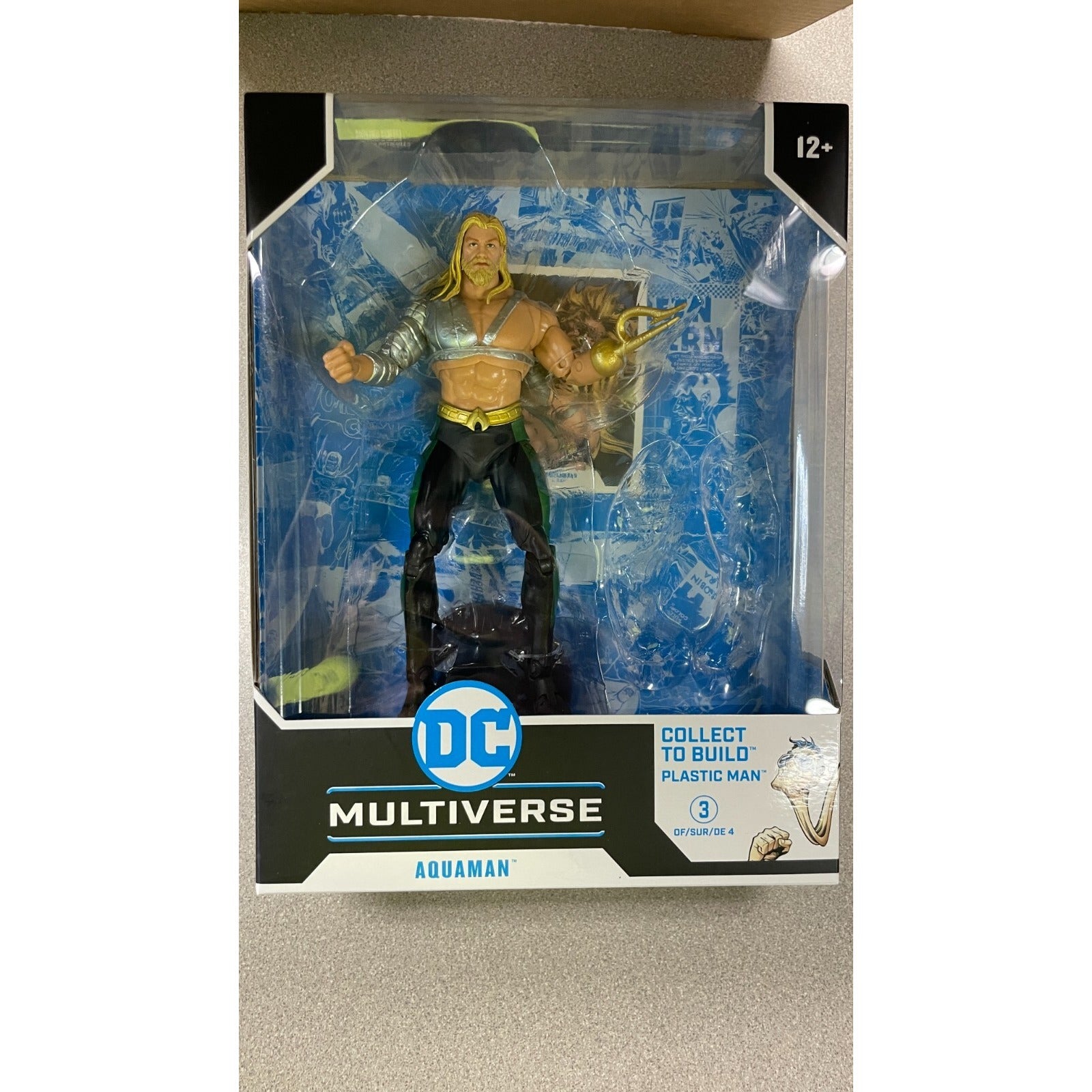 McFarlane Toys DC Multiverse Aquaman Figure, missing a build piece front of package displaying action figure
