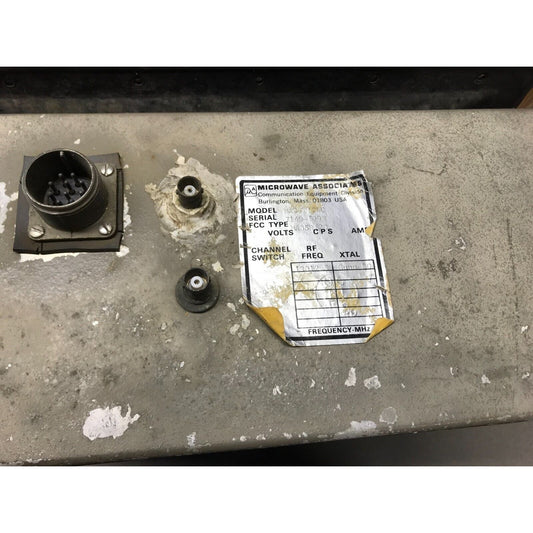 Microwave Associates model MA85T12LC microwave oven component, with visible label, hardware, and schematic diagram, in poor condition.