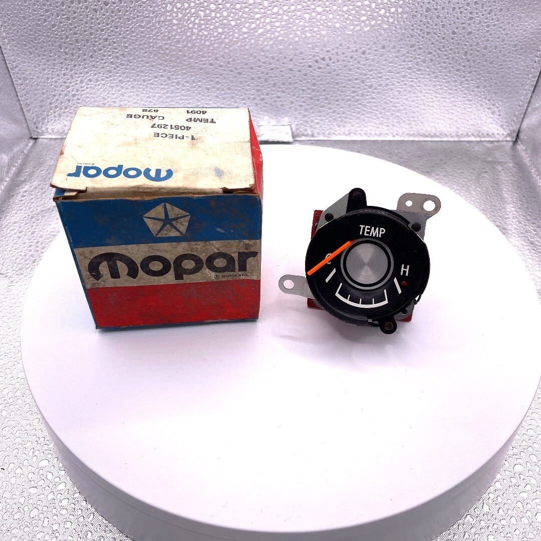 Mopar TEMP GAUGE 4051297 front view and box
