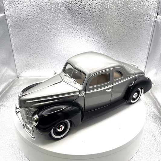 Motor Max 1940 Ford Sedan Silver/Black Die Cast, Scale: 1/18, No. 73108 front end/drivers side view
