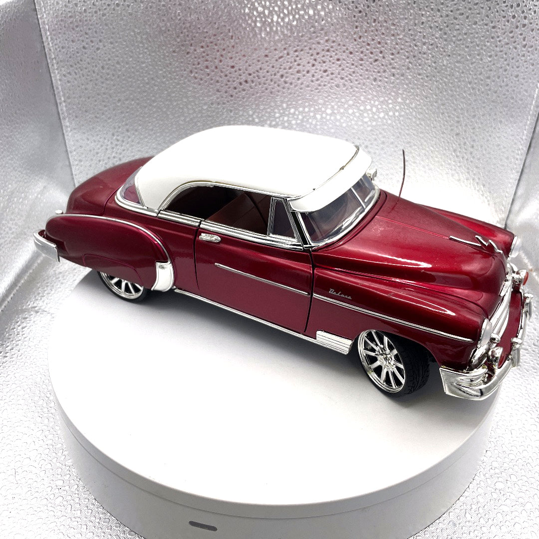 Motor Max 1955 Chevrolet Bel Air Burgundy Die Cast, Scale: 1/18, No. 73184 passenger/front end view