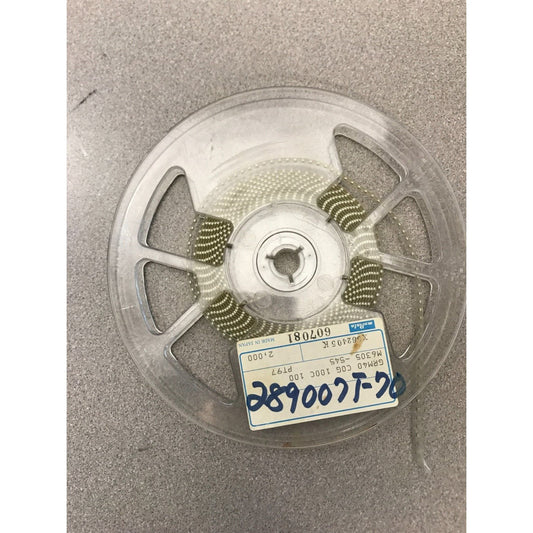 Murata SMD Chip Resistor Stripe GRM40 COG 100C 100 M6305-545 PT97 top view of reel with product label