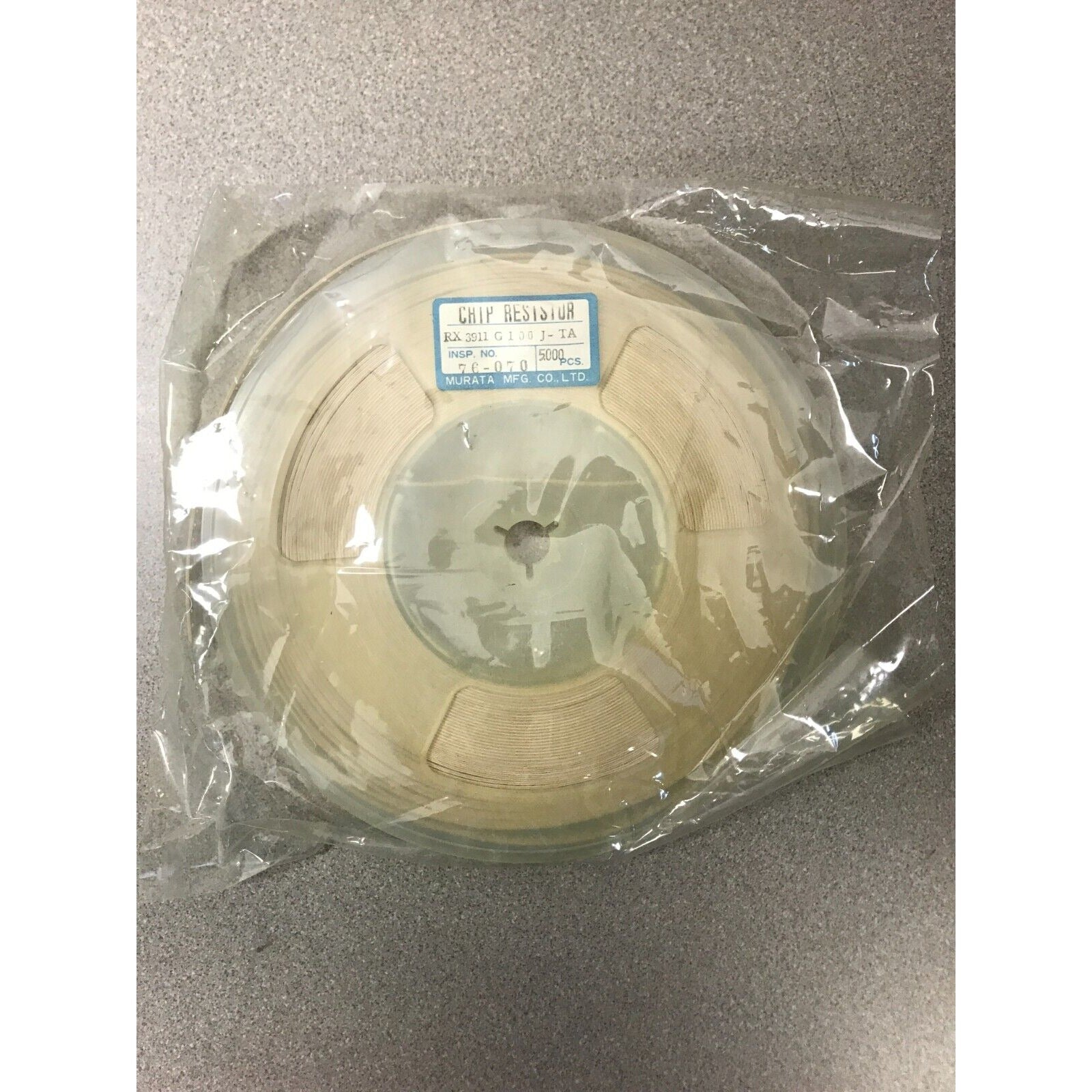 Murata SMD Chip Resistor Stripe RX 3911 G100J-TA top view in packaging