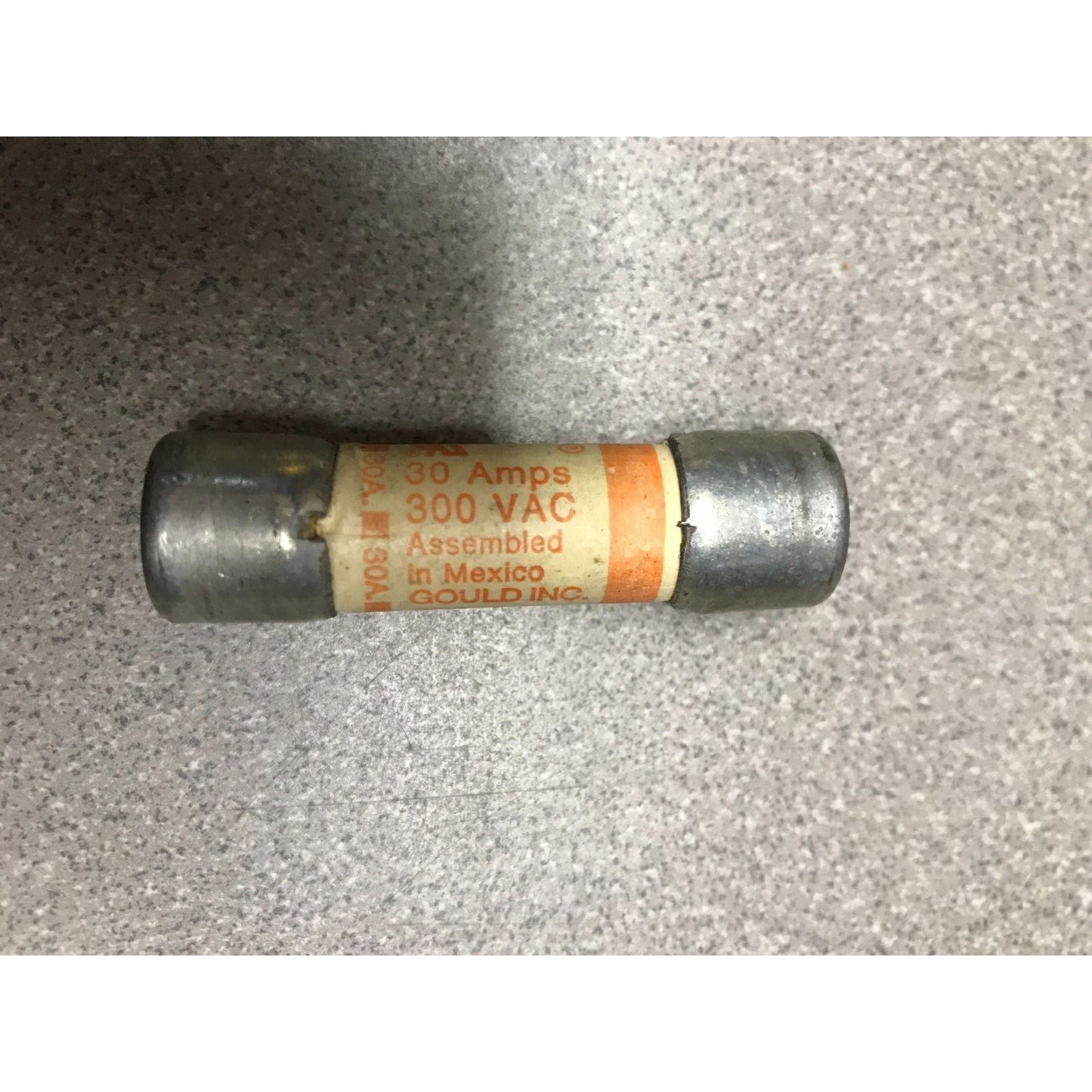 Gould Shawmut A25X30 30A 300VAC Type 1 Fuse  shows 30 Amps, 300 VAC