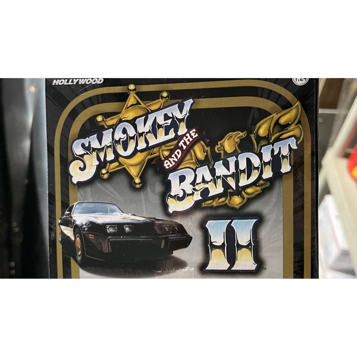 Greenlight Hollywood 1980 Pontiac Trans Am, Smokey and the Bandit II, Die-Cast Model Car 1-24 closeup of description