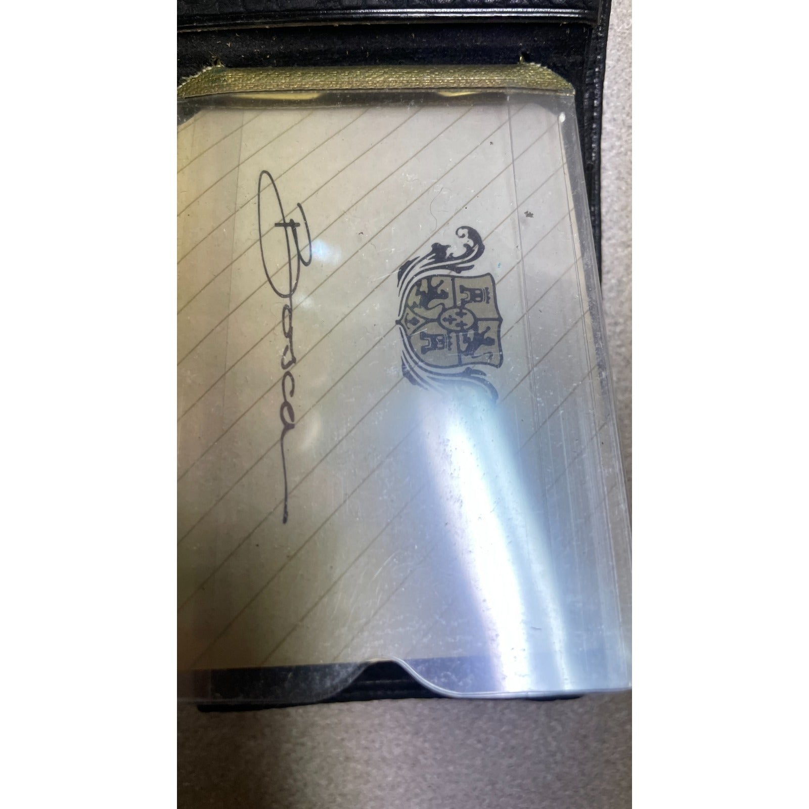 Black Angus by Bosca Wallet closeup of inside view Bosca logo and card sleeve