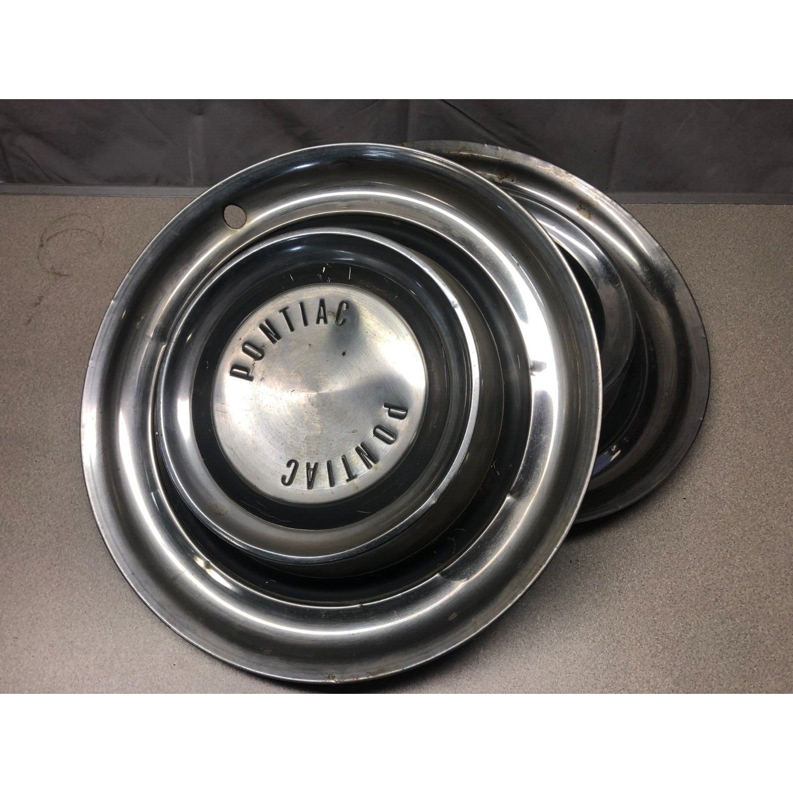 Pair 1958 Pontiac Hub Cap Wheel Cover 14in front view