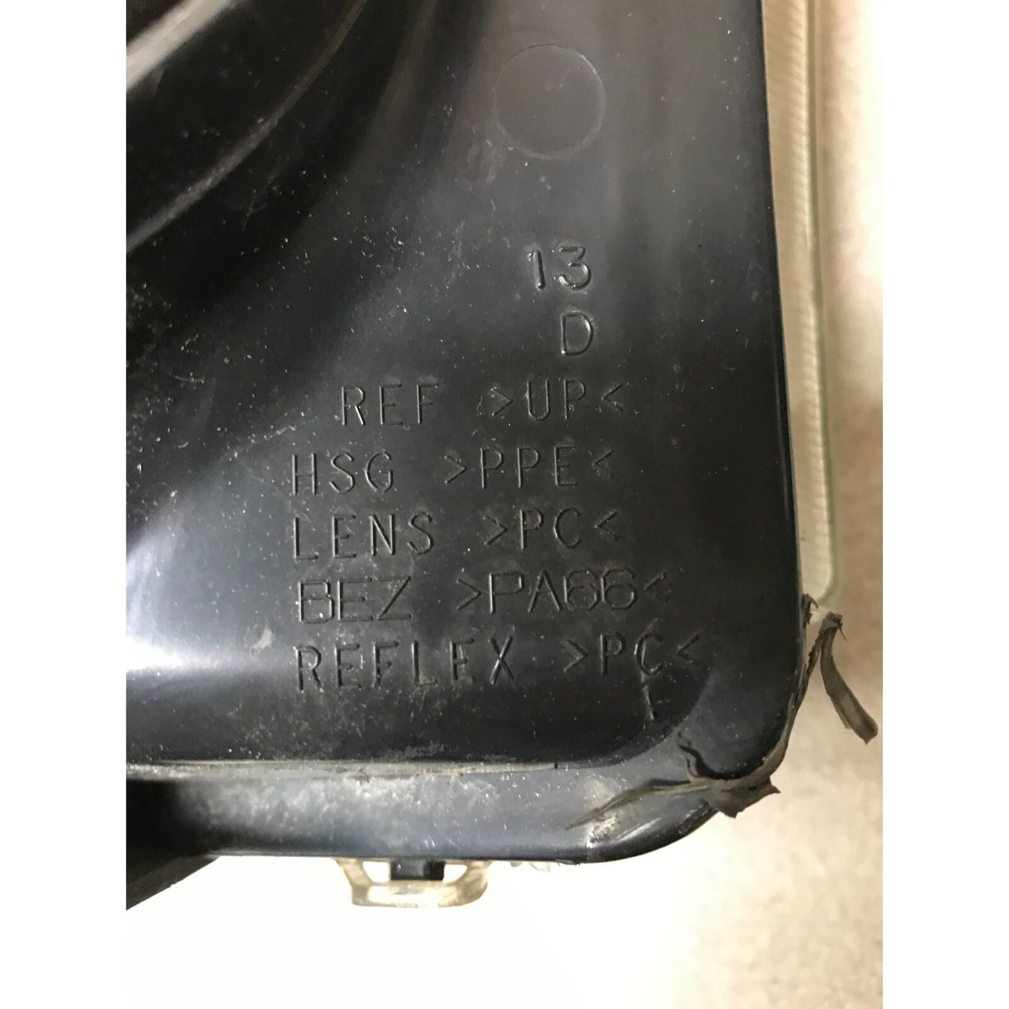 GM 16530938 Right Top Headlight Lens, Fits 2003 Chevy Silverado 2500HD part info stamp