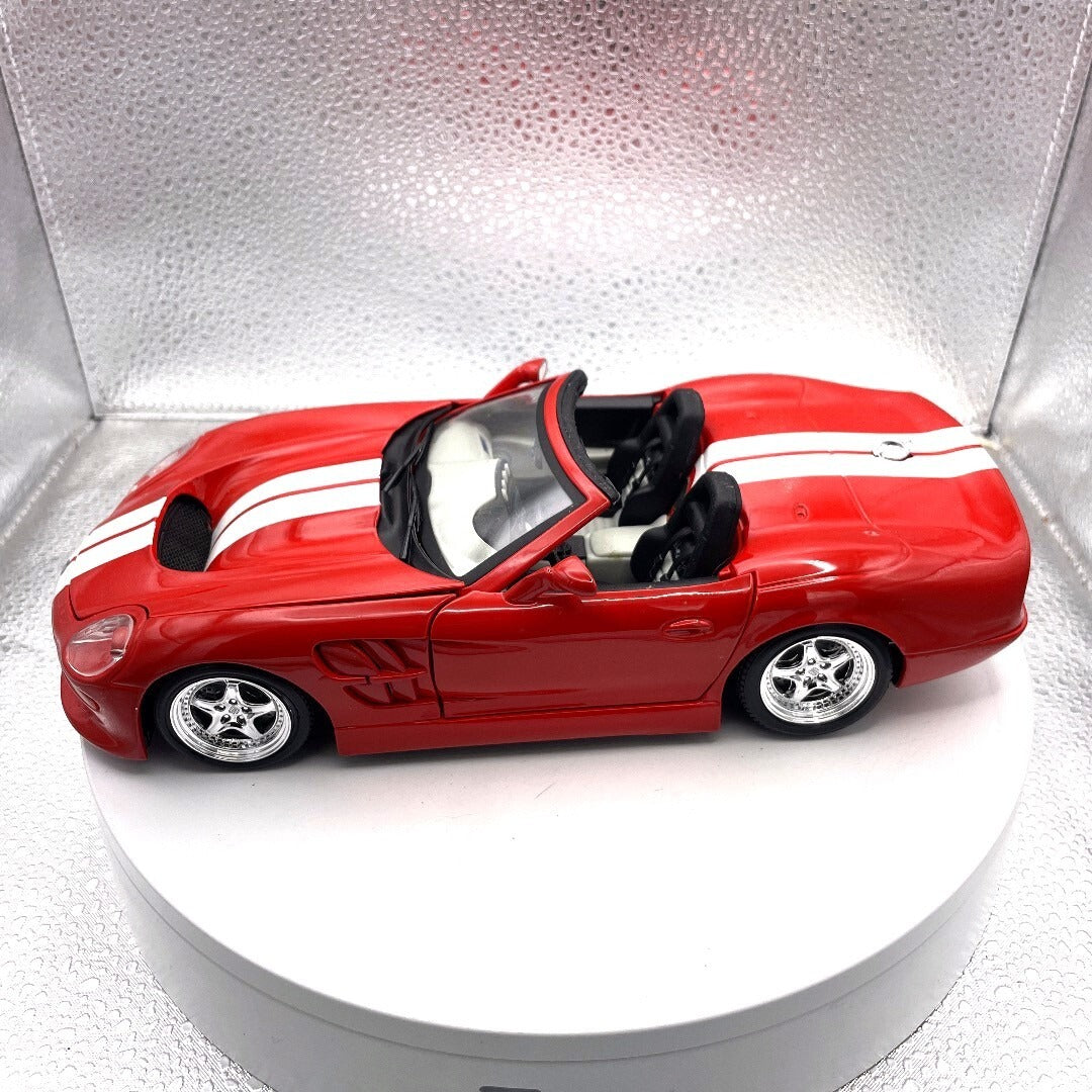 Maisto 1999 Shelby Series One Red Die Cast, Scale: 1/18 11614 driver's side view