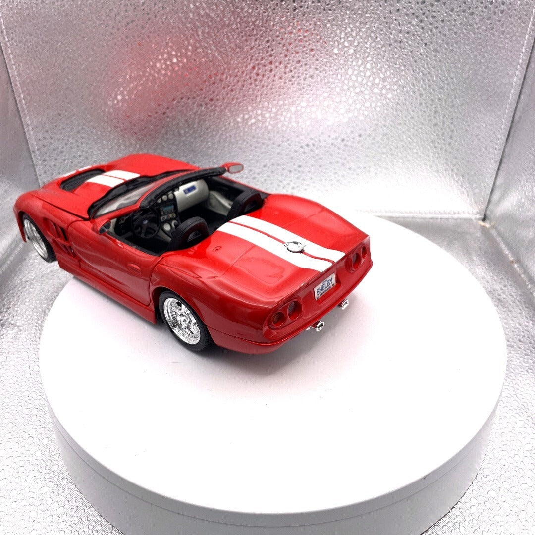Maisto 1999 Shelby Series One Red Die Cast, Scale: 1/18 11614
 driver's side/rear view