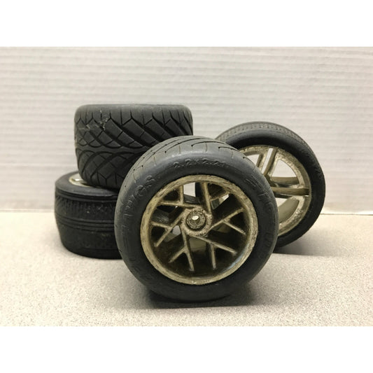 RC Car Traxxas 5577R 4 tires - chrome wheels with foam inserts 2.2 x 2.21