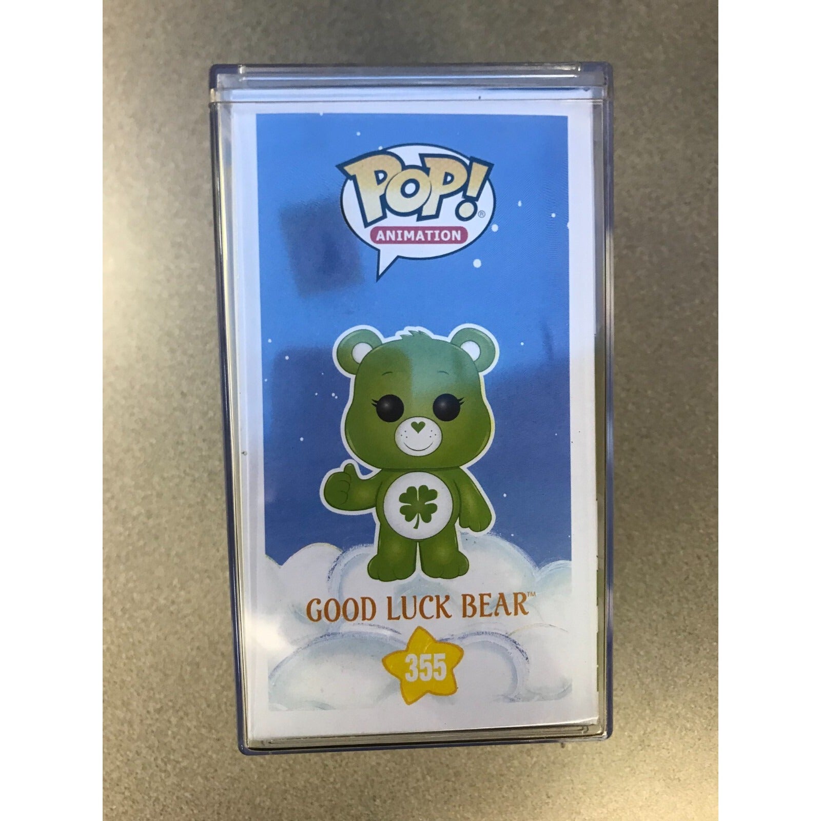 Funko Pop! Care Bears 355 Good Luck Bear with Case Chase front of package bear picture