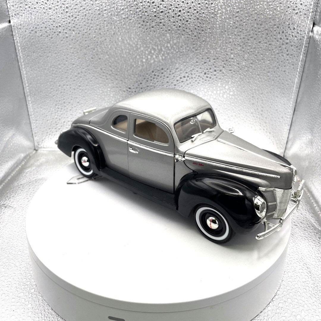 Motor Max 1940 Ford Sedan Silver/Black Die Cast, Scale: 1/18, No. 73108 passenger side/front end view
