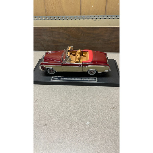 Stauer 1958 Mercedes-Benz 220SE Open Convertible Die Cast, Scale: 1/18 drivers side view on display platform 