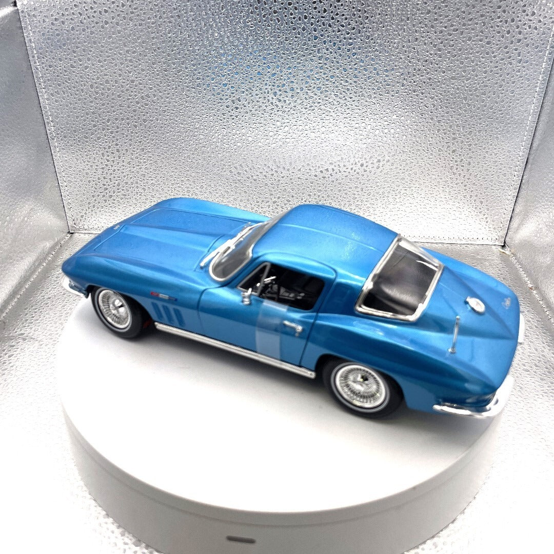 Maisto 1965 Chevrolet Corvette Light Blue Die Cast, Scale: 1/18 driver's side/rear view