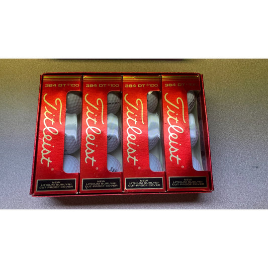 Titleist 384 DT 100 Compression Golf Balls 4 packs of 3 gold balls in box