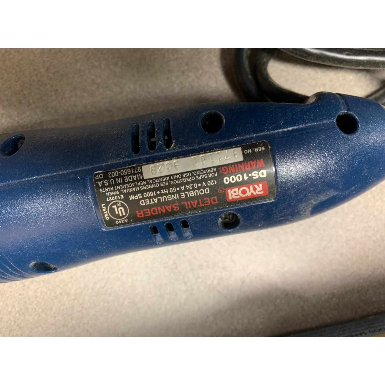 Ryobi Detail Sander DS-1000 closeup of sander product label