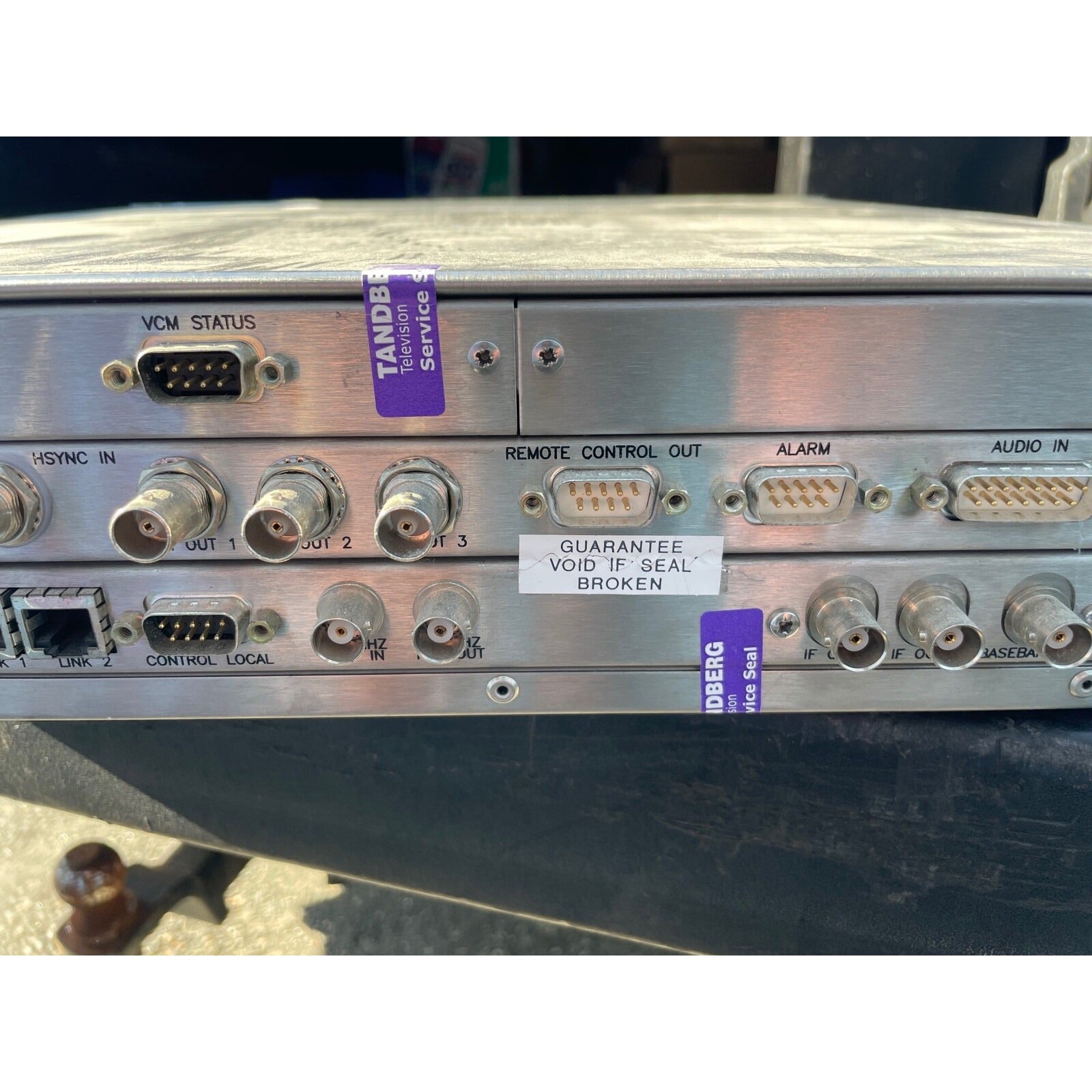 Tandberg Encoder E5100 back panel connections, seal labels unbroken