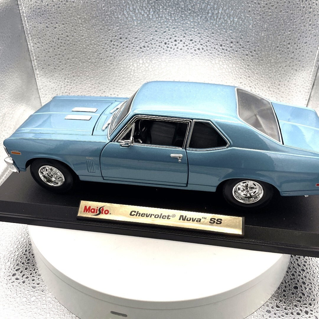 Maisto Chevrolet Nova SS Blue Dies Cast with Base, Scale: 1/18 driver's side view
