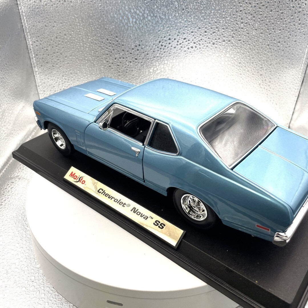 Maisto Chevrolet Nova SS Blue Dies Cast with Base, Scale: 1/18 driver's side/rear view