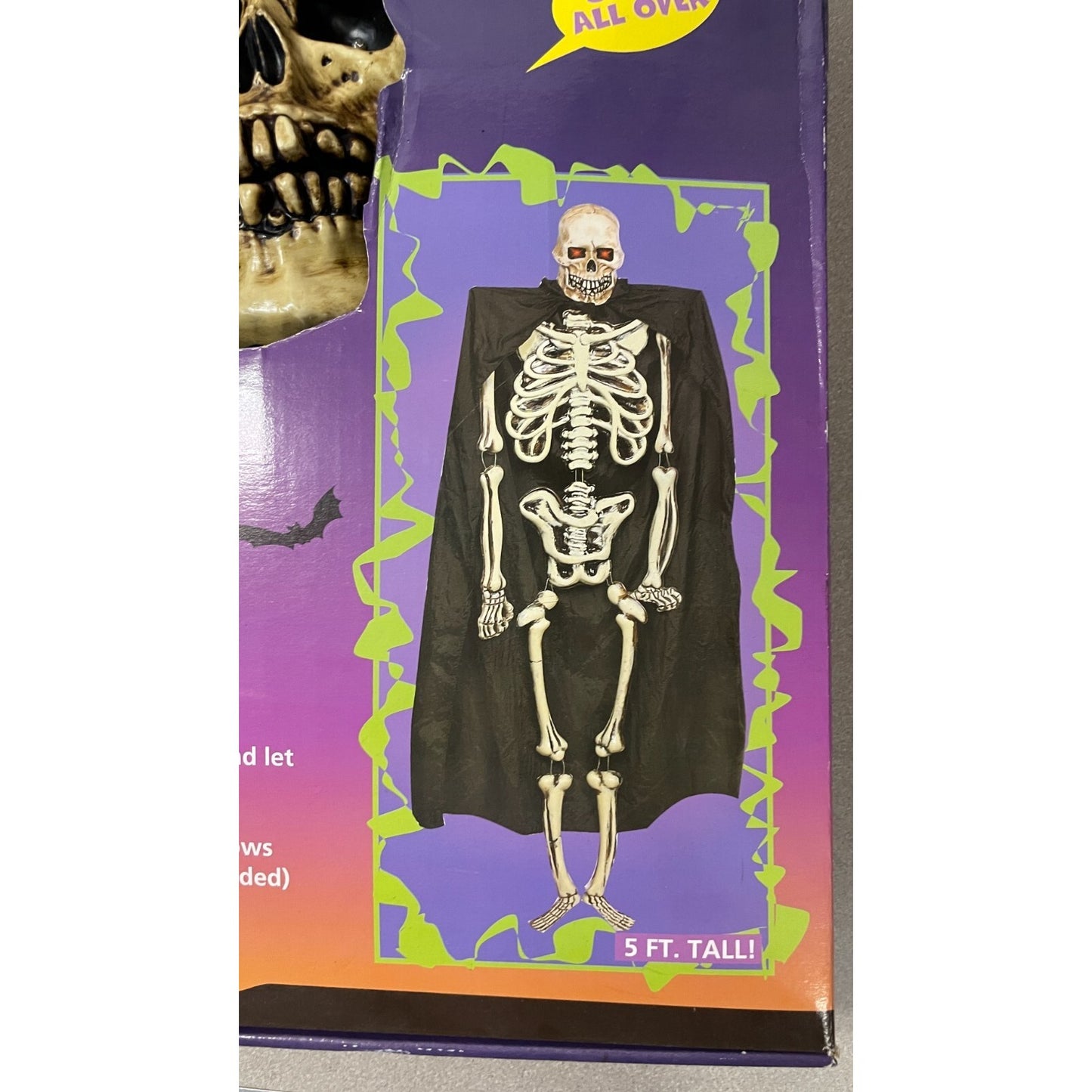 Hallow's Eve Electronic Shaking Skeleton with Cape, Lights and Sound product close up 5 ft. tall