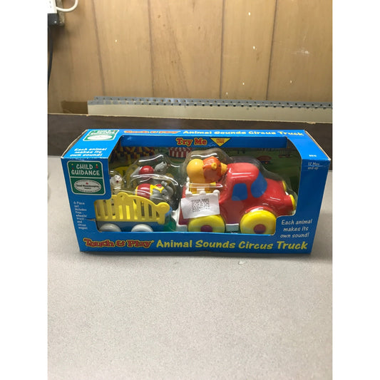 Vintage Touch and Play Animal Sounds Circus Truck front of box displaying toy truck and animals