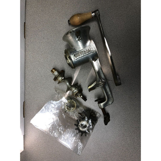 Vintage Universal 2 Meat Grinder full view with accessories in plastic bag