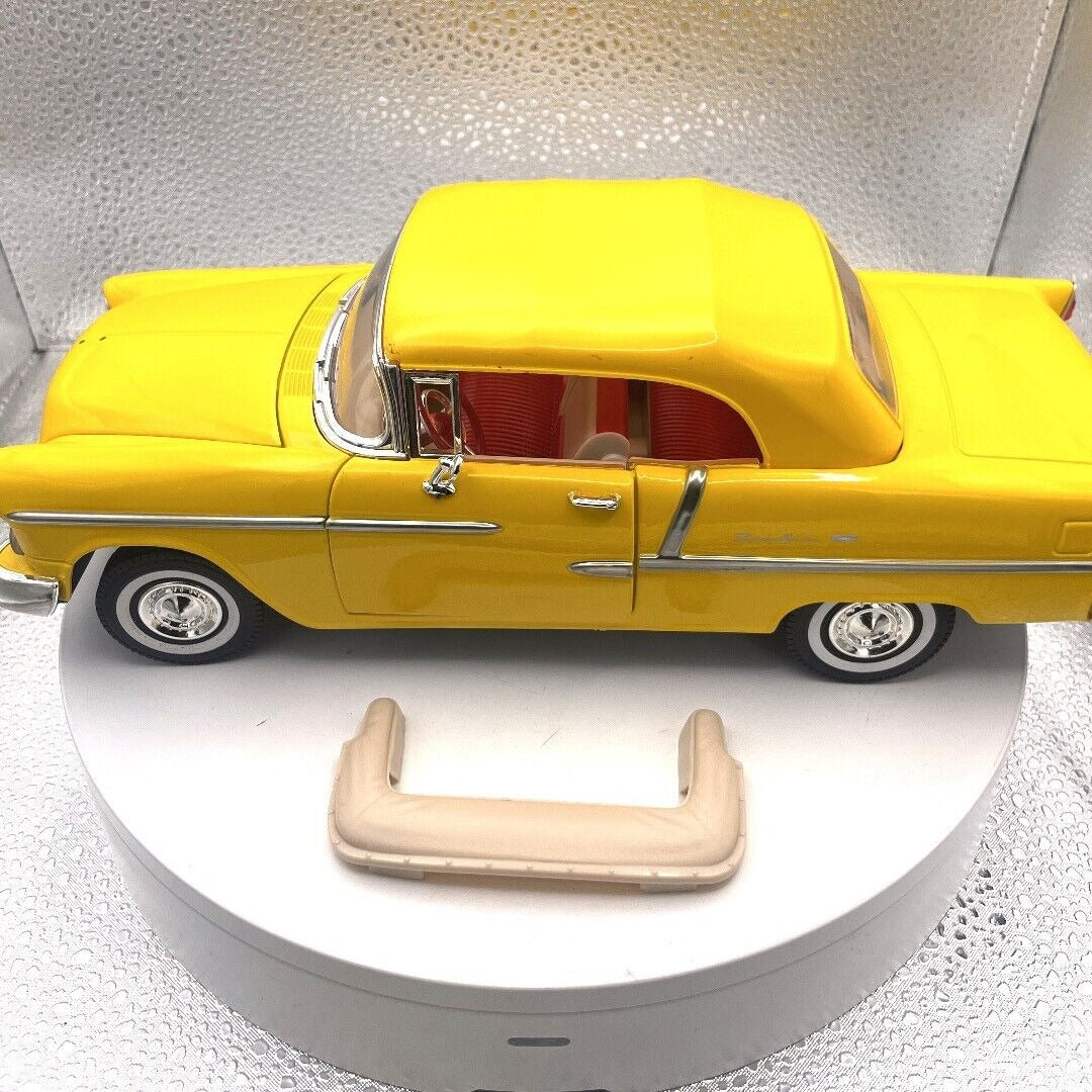 Motormax 1955 Chevrolet Bel Air Yellow Convertible Die Cast, 1/18 Scale, No. 73184 driver's side view