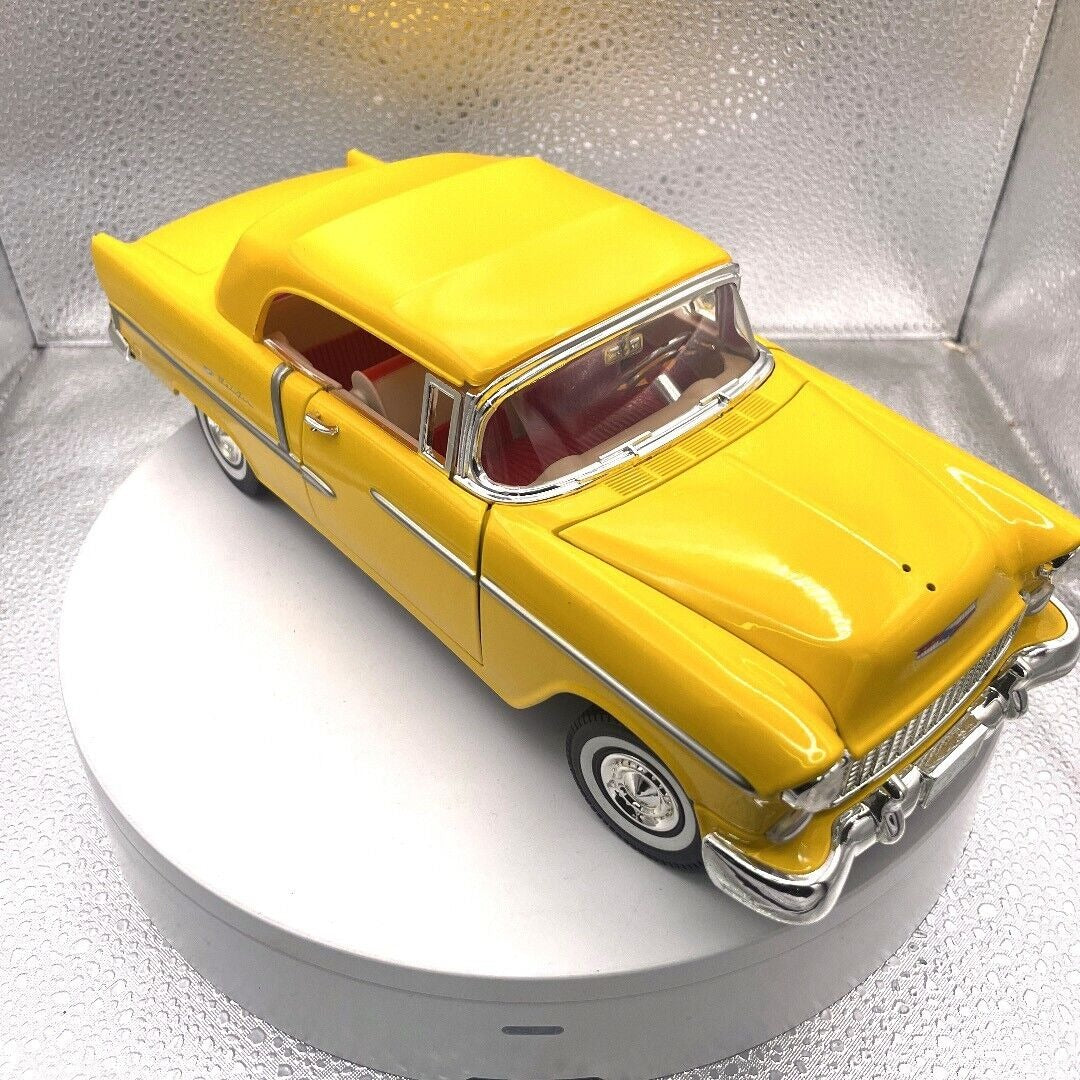 Motormax 1955 Chevrolet Bel Air Yellow Convertible Die Cast, 1/18 Scale, No. 73184 passenger/front side view